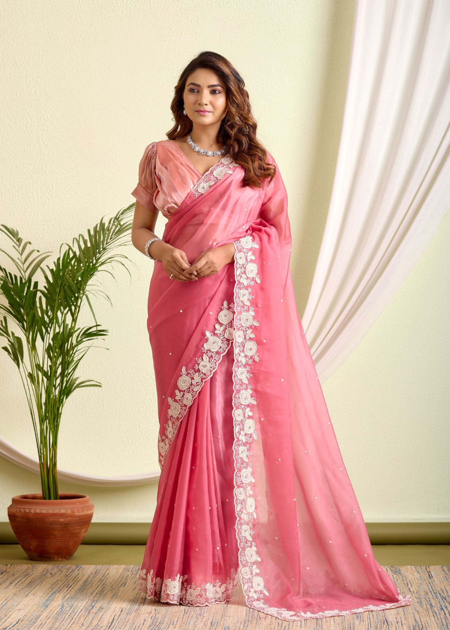 Glass Tissue Saree – A Symphony of Sheer Grace and Embroidery Elegance