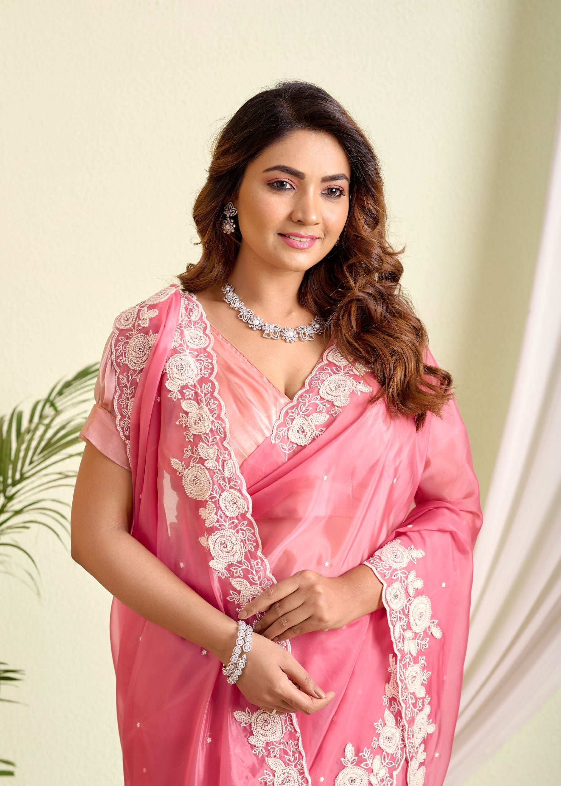 Glass Tissue Saree – A Symphony of Sheer Grace and Embroidery Elegance