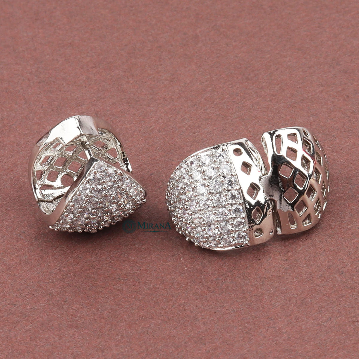 MJER21E151-2-Amazing-TickTock-Triangle-Studs-Silver-Look-7.jpg