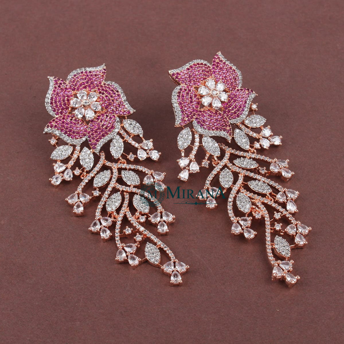 MJER21E318-1-Ira-Flower-Colored-Earrings-Rose-Gold-Ruby-Colored-Look-5.jpg