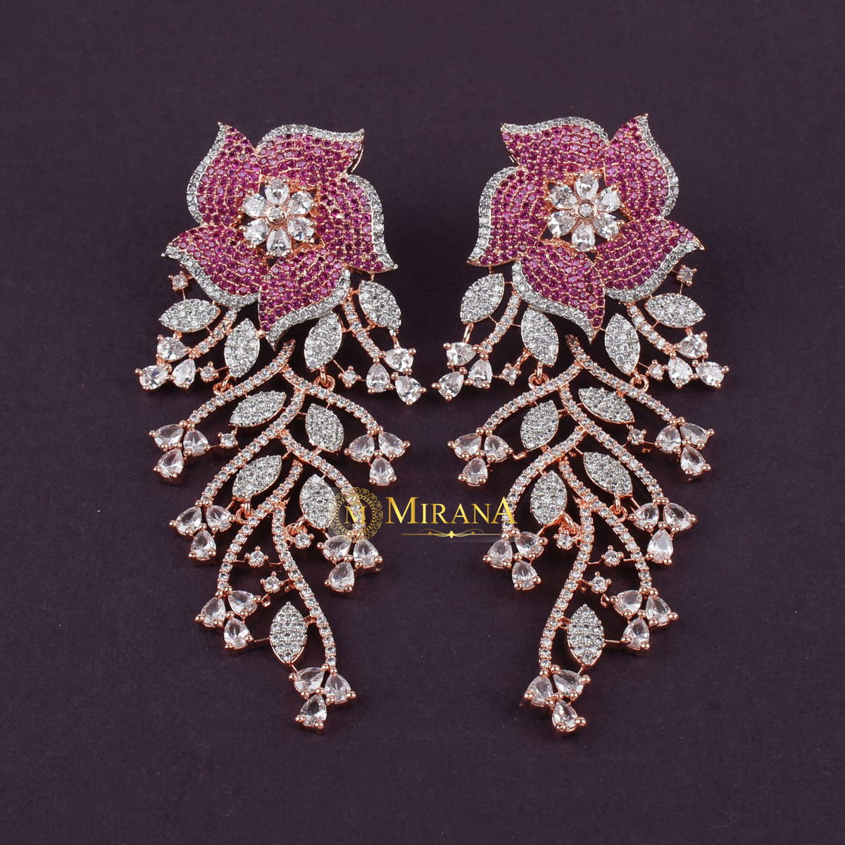 MJER21E318-1-Ira-Flower-Colored-Earrings-Rose-Gold-Ruby-Colored-Look-7.jpg