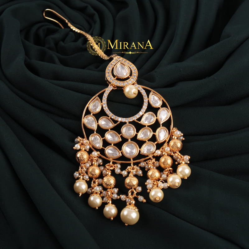 MJMT21T093-3-Radhika-Polki-Colored-Pearl-Beaded-Maangtika-Gold-Look-14.jpg July 14, 2022