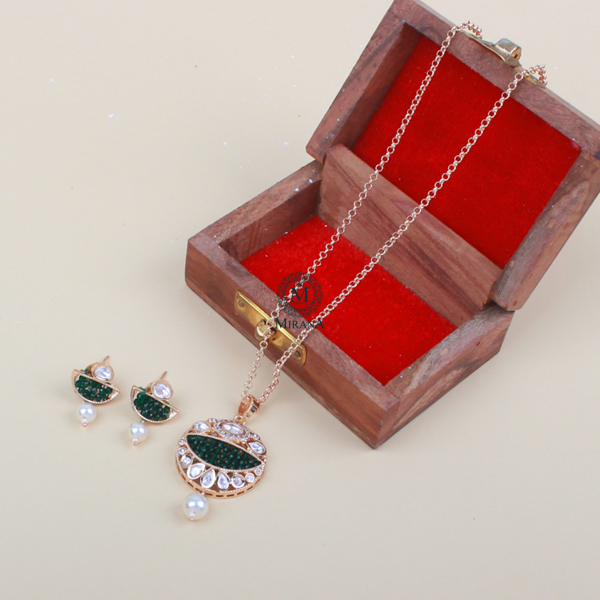 Aarushi Emerald Green Polki Pendant Set