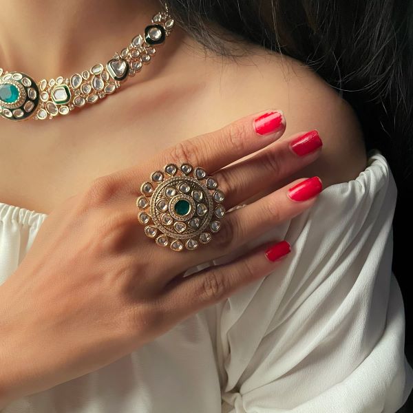 Ishanya Emerald Green Polki Revolving Ring