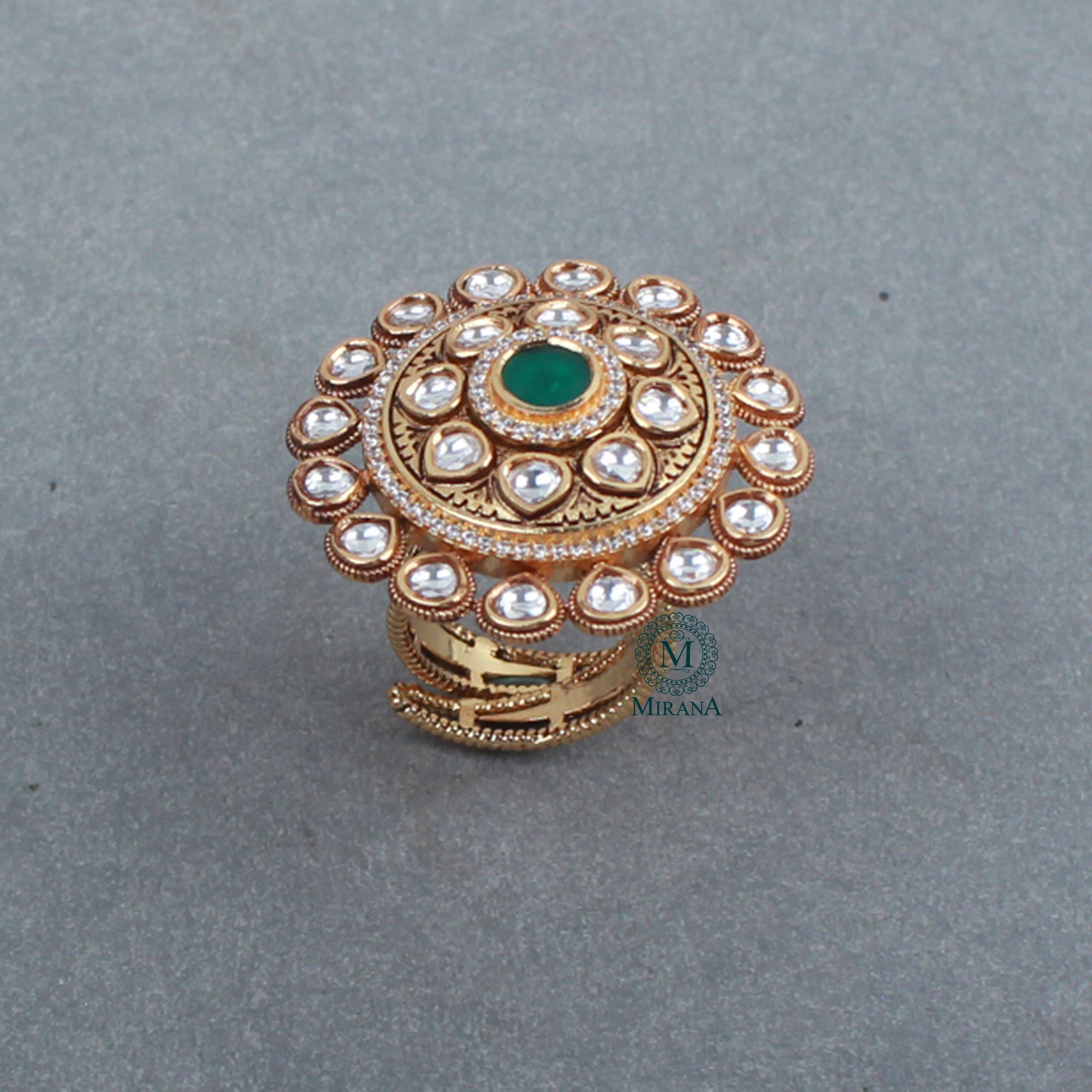 Ishanya Emerald Green Polki Revolving Ring